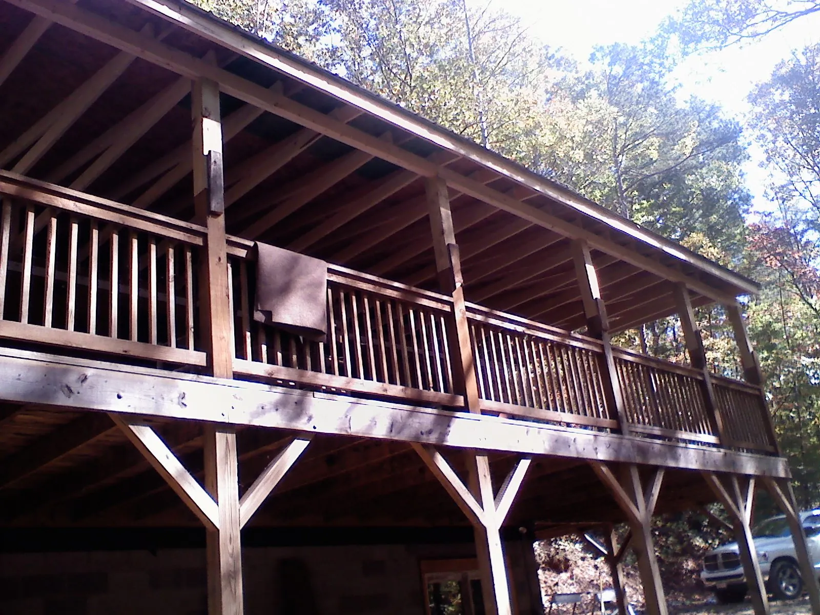 Timber framing under a new elevated porch and deck — Roof Leak Repair in Alameda by Roofing Brothers